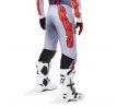 nohavice-alpinestars-supertech-lipan-2025-siva-oranzova-fluo-M171-0236-mxsport